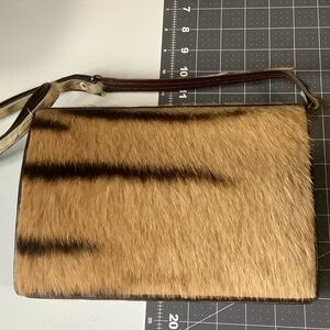 Vintage Animal Hair Print Clutch Bag with suede red lining and pockets.